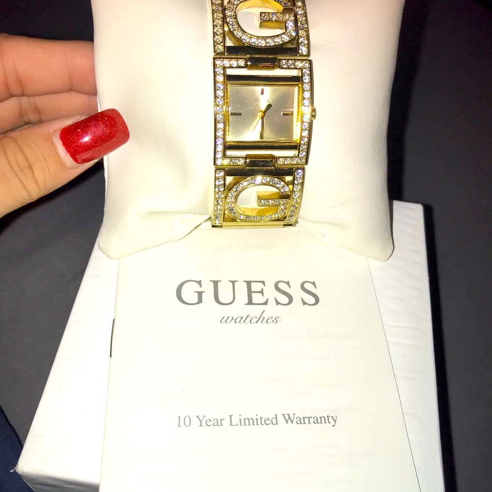 Gold Guess bracelet watch